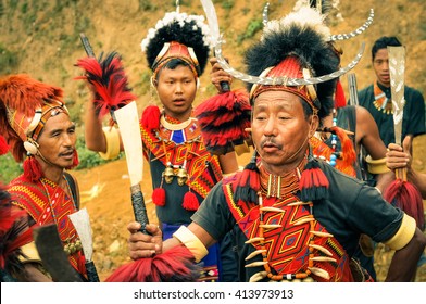 Mon, Nagaland - April 2012: People In Traditional Costumes And Large Hats Dance At Aoleang Festival In Mon, Nagaland. Documentary Editorial.