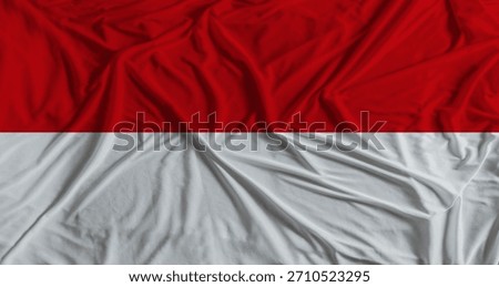 Monaco flag with fabric texture background. National flag of Monaco