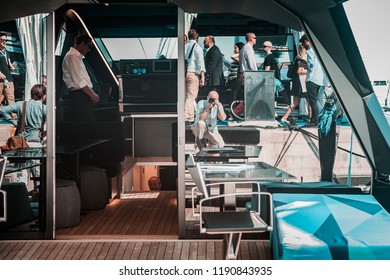 Monaco, Monte-Carlo, France, September 27, 2018: Moments From The Annual Monaco Yacht Show, Focusing On Luxury Power Boats. Checkmate By Wally Yachts. Port Hercules, Rich Brokers, Having Fun.