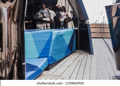 Monaco, Monte-Carlo, France, September 27, 2018: Moments From The Annual Monaco Yacht Show, Focusing On Luxury Power Boats. Checkmate By Wally Yachts. Port Hercules, Rich Brokers, Having Fun.