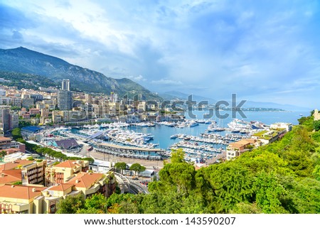 Monaco Montecarlo principality aerial view cityscape. Skyscrapers, mountains and marina. Azure coast. France, Europe.