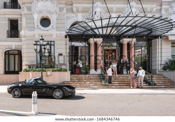 Monaco, September\
14, 2018:  The entrance to the Hotel de Paris with its\
characteristic glass canopy in\
Monaco