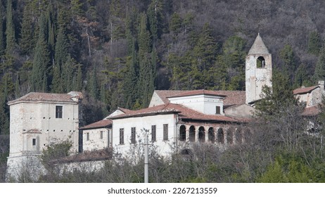 Monastery on Sebino lake. San Pietro in Lamosa. Cluniacian monastery founded in 1083, in Brescia province. Iseo lake. - Late winter views, landscape and cloister. - Shutterstock ID 2267213559