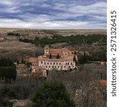 Monastery of Santa Cruz la Real. 13th-15th centuries. Romanesque style Dominican convent, founded by Santo Domingo de Guzman in 1218. View from Puerta de Santiago Gate. Segovia, Spain.