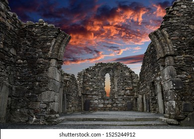 Monastic cemetery of Glendalough, Ireland. Famous ancient monastery while sunset in the wicklow mountains with a beautiful graveyard from the 11th century 