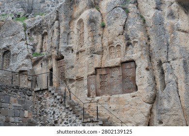 Rock‑Cut Monastic Chambers in Geghard Monastery Ancient Carved Niches and Stairway