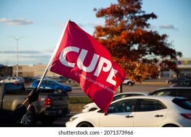 Moncton, New Brunswick, Canada 11.05.2021: CUPE Flag Picket Rally In New Brunswick. Province-wide Strike. Striking Government Employees. Canadian Union Of Public Employees