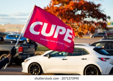 Moncton, New Brunswick, Canada 11.05.2021: CUPE Flag Picket Rally In New Brunswick. Province-wide Strike. Striking Government Employees. Canadian Union Of Public Employees