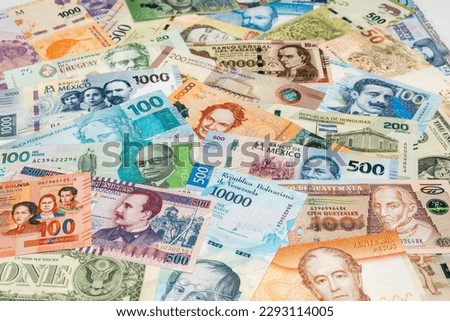 Money from all Latin American countries, High denominations, World currency concept, close up, financial background