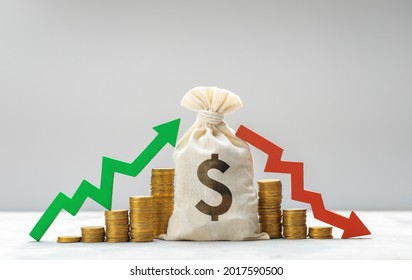 Money Bag With Daollar Sign. Graph Is Growing Green Arrow Up And Graph Of Falling Red Arrow Down On The Background Of A Stack Of Coins. Market Fluctuation Concept.