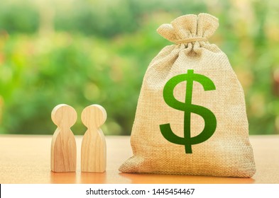 Money Bag With Dollar Symbol And Two People Figures. Investment And Lending, Leasing. Business Dispute And Its Solution Between Two Businessmen. Available Loans And Subsidies, Government Support