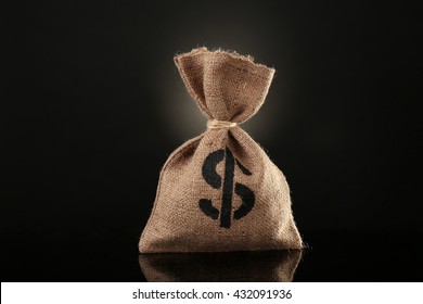 Money Bag On Black Background