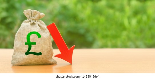 Money Bag With Pound Sterling Symbol And Red Arrow Down. Brexit Great Britain. Depreciation Of The Pound, Economy Fall. Economic Difficulties, Departure Of Capital