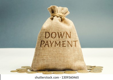 Money Bag With The Word Down Payment. Payment Used In The Context Of The Purchase Of Expensive Items Such As A Car And A House, Whereby The Payment Is The Initial Upfront Portion Of The Total Amount