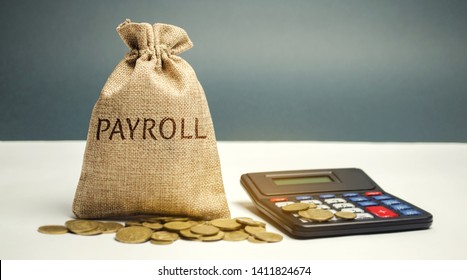 Money Bag With The Word Payroll And Calculator. Payroll Is The Sum Total Of All Compensation A Business Must Pay To Its Employees For A Set Period Of Time Or On A Given Date. Taxes. Management