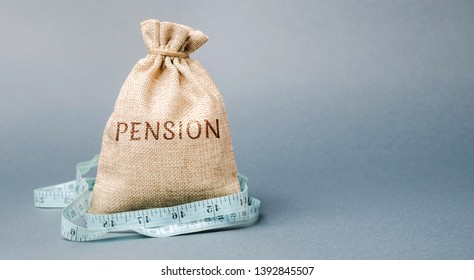Money bag with the word Pension and tape measure. Fall / reduction pension payments. Retirement. Financing retirees. Reduction of the pension fund. The low size of pensions. Poverty. Lack of money - Shutterstock ID 1392845507