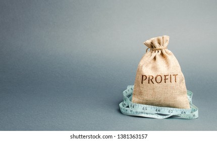 Money Bag With The Word Profit And Tape Measure. The Concept Of Limited Profit. Lack Of Money And Poverty. Small Income. Salary Reduction. Unsuccessful Business. Family Budget. Financial Crisis