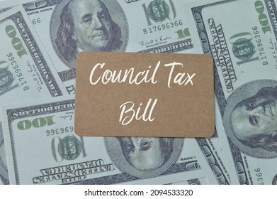 Money Banknotes And Brown Card With Text COUNCIL TAX BILL