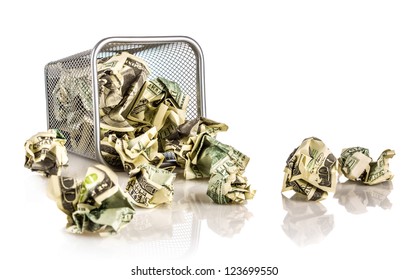 Money in a basket on a white background