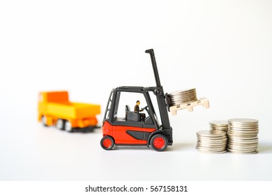 Money and Business Financial Concept Money Loading / delivering on Forklift Truck, Money stack pile of coins, collecting, saving background