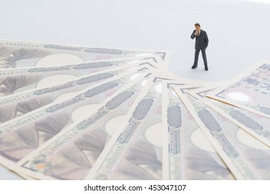 Money and businessman - Shutterstock ID 453047107