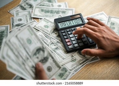 Money And Calculator Mobile Money Press Calculator Worsening Economy Or Inflation Business Concept.