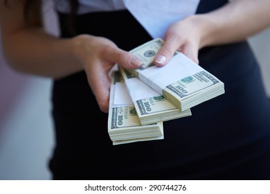 Money close-up in women's hands - Shutterstock ID 290744276