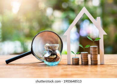 Money coin savings set with house structure for concept investments mortgage finance and refinance home loan