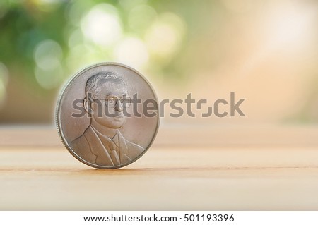 Money coin thai currency  on the wood background;king of thailand.