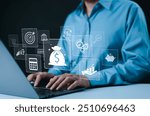 Money concept. Businessman using laptop with digital icons represent financial management, savings, investment, banking, and monetary transactions. The focus is on money and finance in the digital age