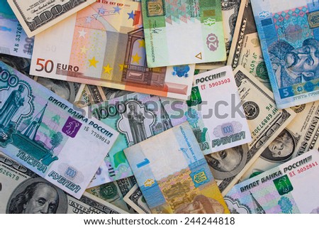 Money from different countries: dollars, euros, hryvnia, rubles