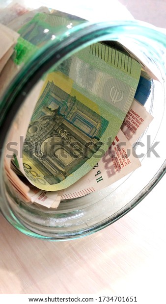 A lot of money, different countries, different\
equivalents.Business photos.