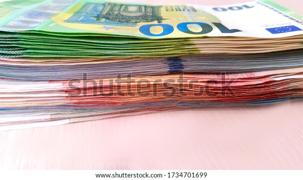 A lot of money, different countries, different\
equivalents.Business photos.