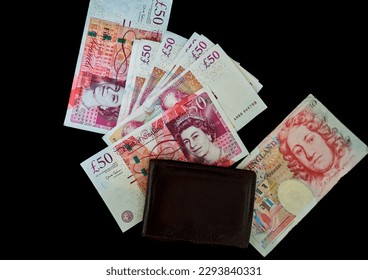 money English pounds lie on a black background