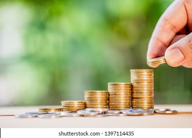 Money, Financial, Business Growth Concept, Man's Hand Put Money Coins To Stack Of Coins