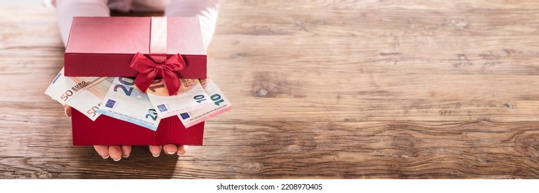 Money Gift Or Bribery. Giving Euro Cash