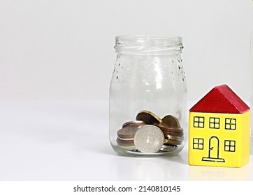 Money In Glass Jar On Table Representing Property Purchase No People Stock Photo 