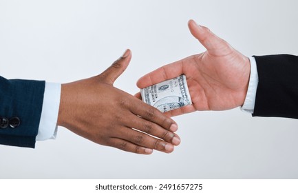 Money, handshake and business people for deal in studio for theft, bribery and finance corruption. Corporate, cash and workers shaking hands for secret payment, blackmail and fraud on gray background - Powered by Shutterstock