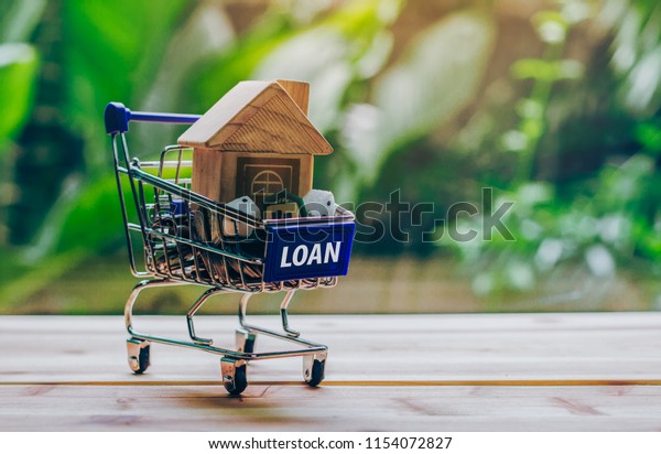 Money, House are in trolley In front of with the\
words \
