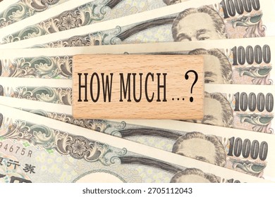 A money image composition asking about the amount using HOW MUCH and Japanese banknotes.