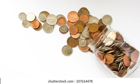 money jar emptied over white background
