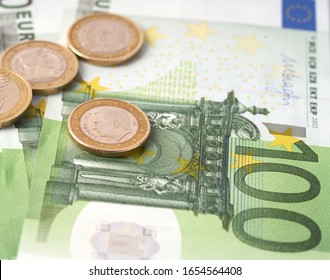 Money laundering on clothesline on light background. 100 eur notes. 100 eur banknotes.