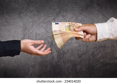 Money Loan. Bank Officer Loaning Stack Of Euro Banknotes Money.