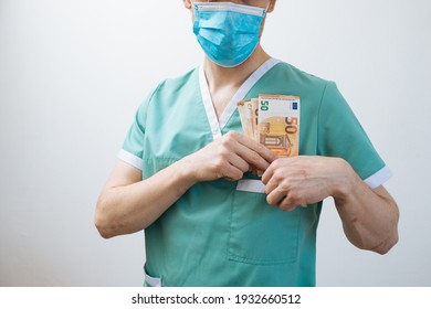 Money And Medical Doctors. Health System And Economy. Doctor Holding Payment Bills. Corrupted Health Care System Concept. Cost Of Health Insurance. Bribing A Doctor. Pharma Companies Offer A Bribe