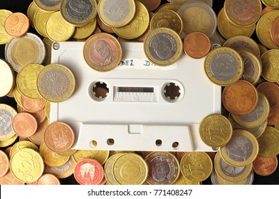 Money and Music Concept Tape Music cassette and Coins