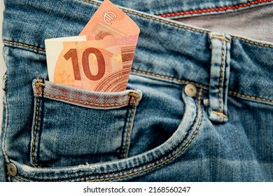 Money In My Jeans Pocket, Euros In The Back Pocket Of Blue Jeans. Concept Of Wealth And Wellbeing. Spending Cash In The Supermarket, Unplanned Purchases.