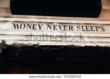 Money never sleep letters wallstreet style