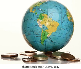 Money Piled Up On A Table With Globe With White Background Stock Photo 