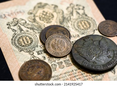 Money Of Russian Empire, Old Coins And Banknote. Antique Copper Coins And Paper Currency With Imperial Coat Of Arms Of Russia. Concept Of History, Vintage Rare Coins, Economy And Numismatics. 