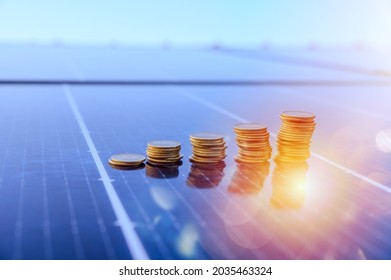 Money saved by using energy with solar panel - Shutterstock ID 2035463324